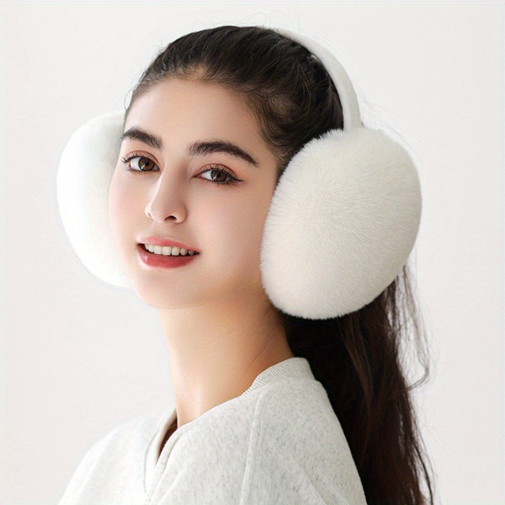 Stay cozy and stylish this winter with our Women's Foldable Knit Cashmere Earmuffs. Crafted with faux fur for warmth and comfort, these earmuffs are perfect for outdoor activities. The stretchable plush design hugs your ears, keeping them