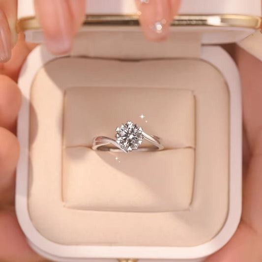 1. Equally sparkling 2.1g Moissanite Solitaire Engagement Ring featuring a 0.5/1 CARAT stone set in a six-prong design. This Shiny Promise Ring also doubles as a Female Wedding Band.