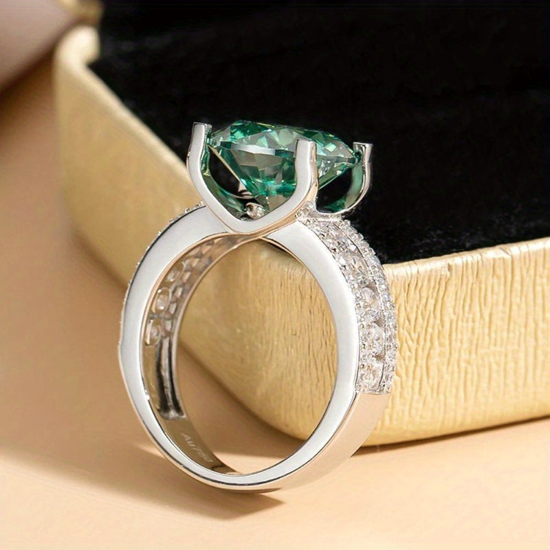 Gorgeous Blue-Green Moissanite Engagement Ring - Available in 3, 5, or 10 Carats, Set in Luxurious 925 Sterling Silver with 4 Prongs. The Perfect Gift for Her on Valentine's Day and Beyond. Let Your Love Spark and Grow with This Stunning Ring.