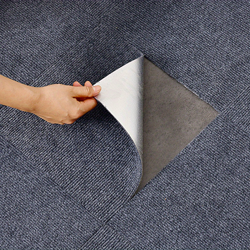 A single Self-Adhesive Soundproof Carpet Tile measuring 30.48cm x 30.48cm. Made of a machine washable polyester blend, ideal for enhancing home decor.