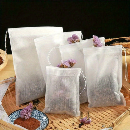 200 pieces of disposable tea bags, made of non-woven fabric and featuring a convenient drawstring closure, perfect for steeping loose leaf tea and spice sachets.