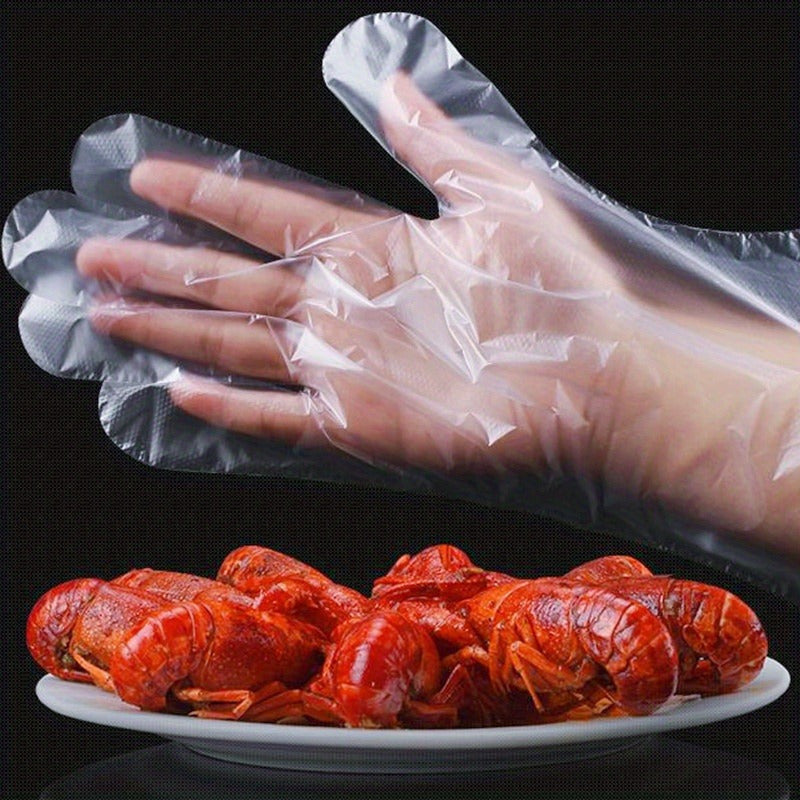 200 pieces of disposable plastic gloves made from waterproof PET (Polyethylene Terephthalate), free from lead. Ideal for cooking, food preparation, BBQ, kitchen use, restaurant service, and craft making.