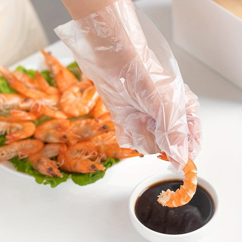 200 pieces of disposable plastic gloves made from waterproof PET (Polyethylene Terephthalate), free from lead. Ideal for cooking, food preparation, BBQ, kitchen use, restaurant service, and craft making.