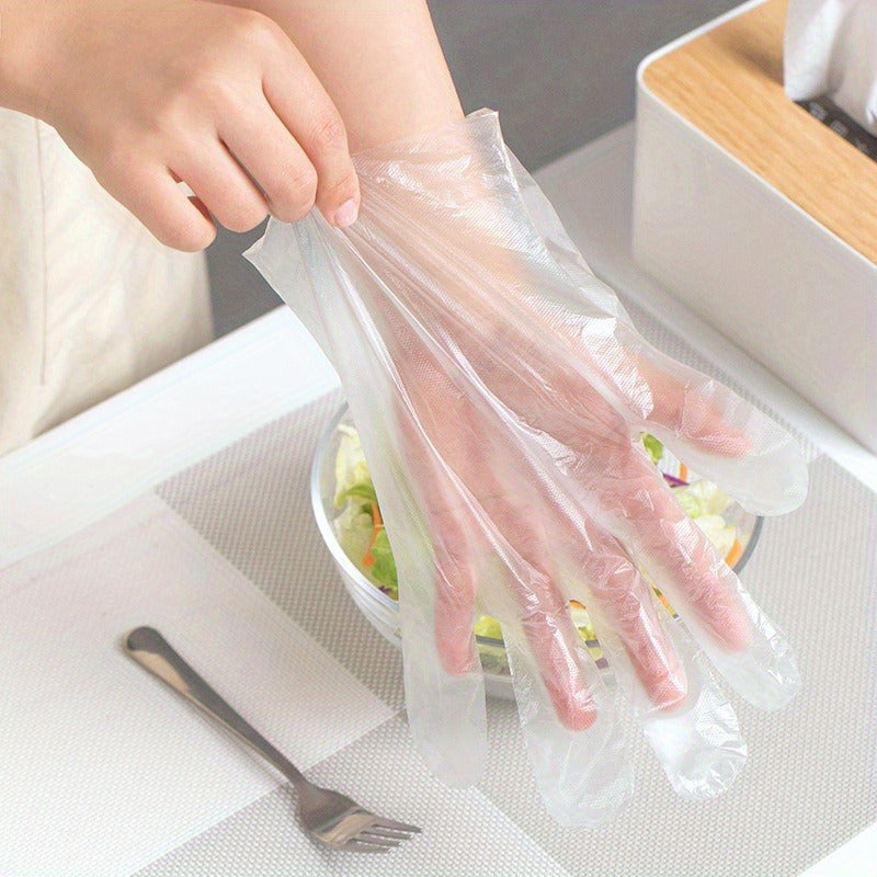 200 pieces of disposable plastic gloves made from waterproof PET (Polyethylene Terephthalate), free from lead. Ideal for cooking, food preparation, BBQ, kitchen use, restaurant service, and craft making.