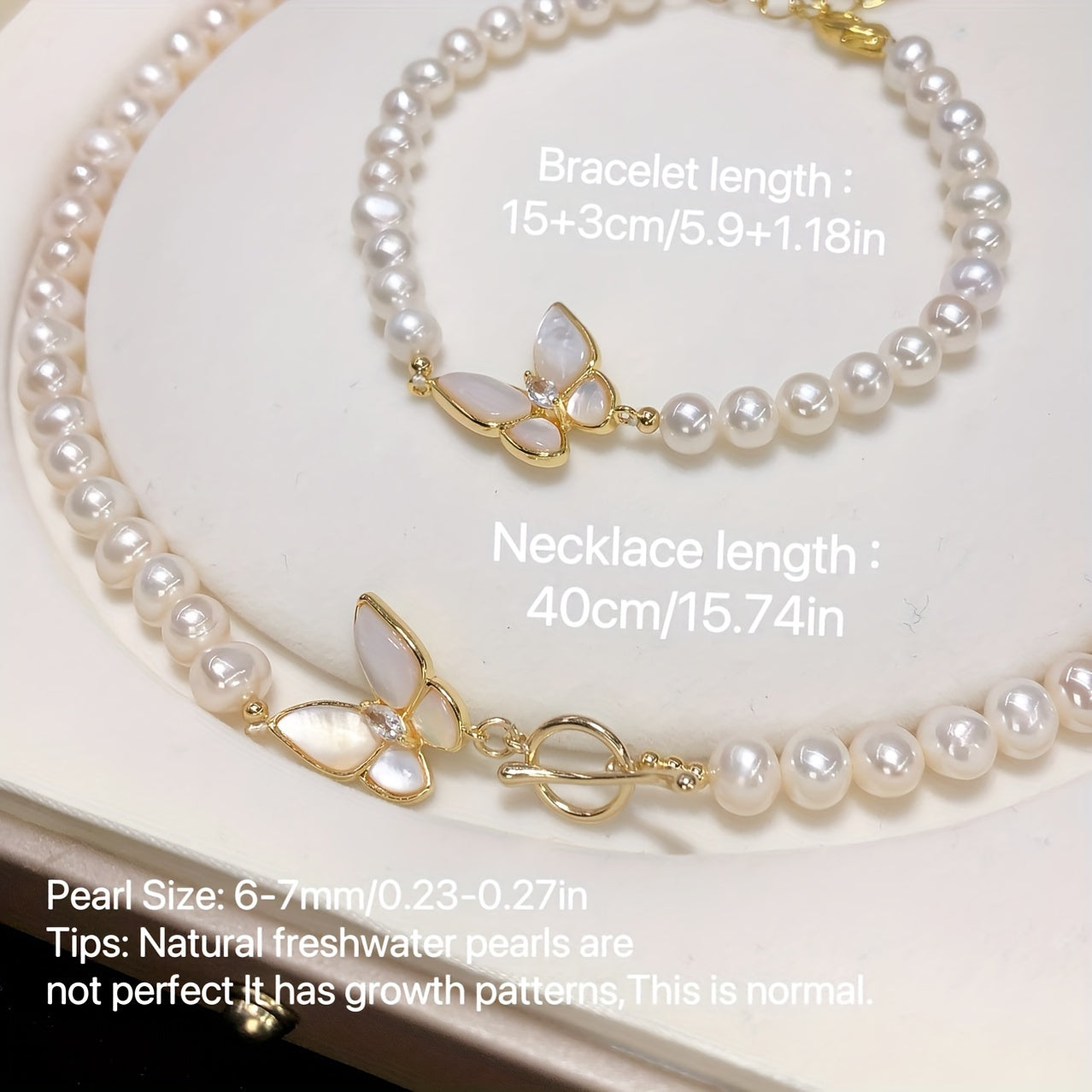 Stylish freshwater pearl jewelry set in French-Boho style, features a necklace and bracelet set without mosaic design. Versatile for all seasons, makes a perfect Mother's Day gift and an ideal accessory for parties or everyday wear.