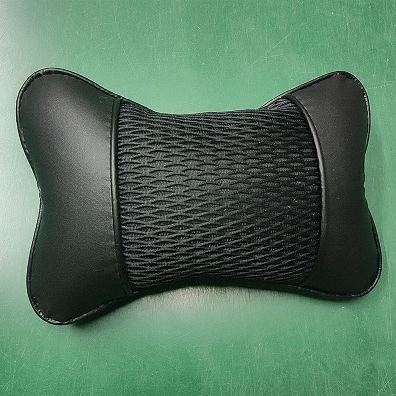 Soft and comfortable car headrest pillow with red accents, enhances driving comfort and style, made of breathable PU leather mesh.