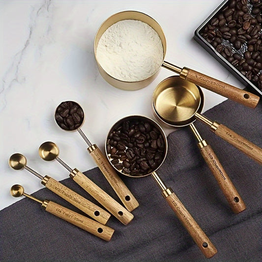 8 piece stainless steel measuring cups and spoons set with durable acacia wood handles, including spice and coffee scoops, nesting design for easy storage.