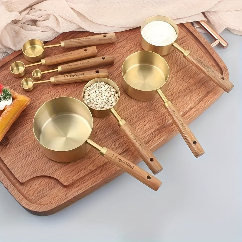 8 piece stainless steel measuring cups and spoons set with durable acacia wood handles, including spice and coffee scoops, nesting design for easy storage.