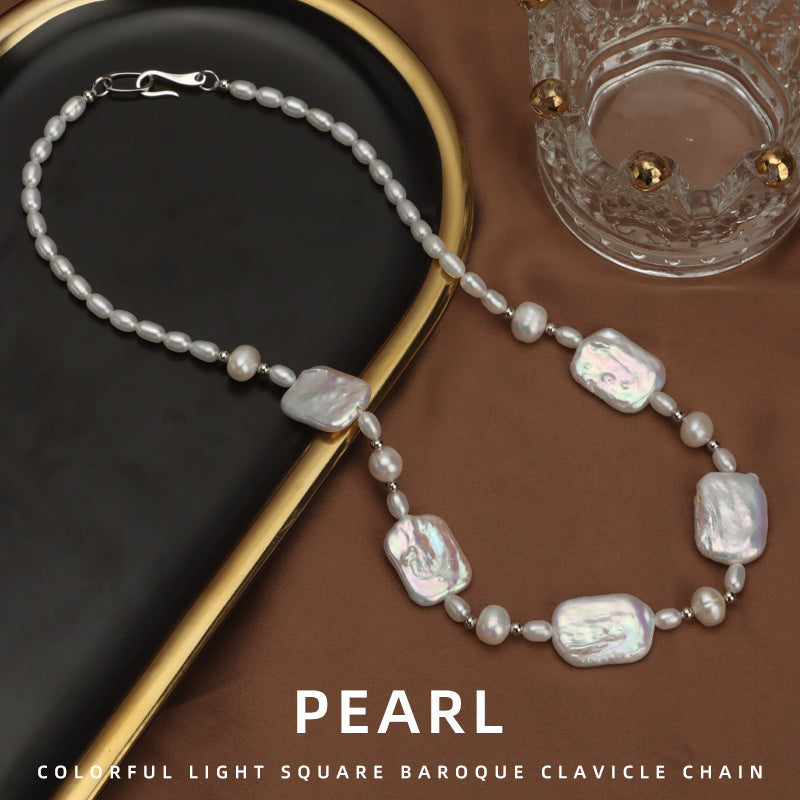 Elegant and fashionable, the ZAYCAN Baroque Art Pearl Necklace features a vintage petal design with natural freshwater pearls on a silvery body. This accessory adds a touch of vintage style to any outfit and is perfect for banquets, weddings, or as a