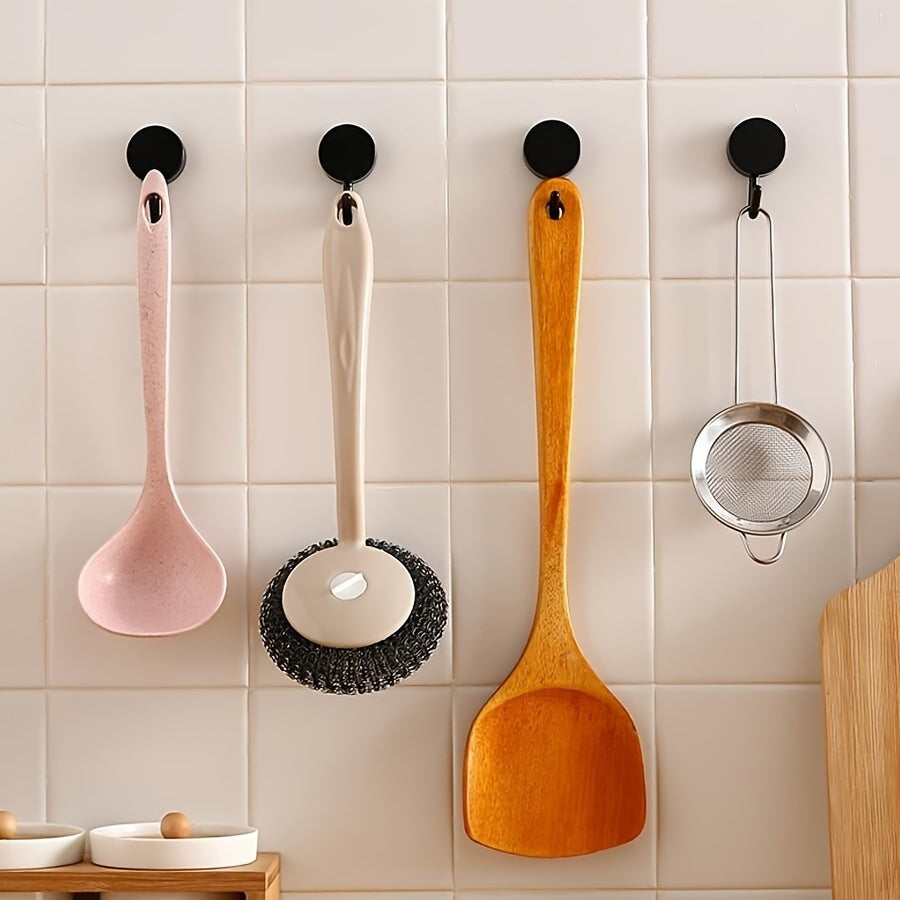 10 colorful adhesive hooks for easy wall-mounted storage in kitchen and bathroom, no drilling needed.