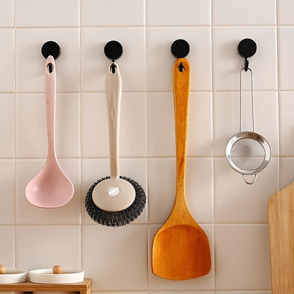 10 colorful adhesive hooks for easy wall-mounted storage in kitchen and bathroom, no drilling needed.