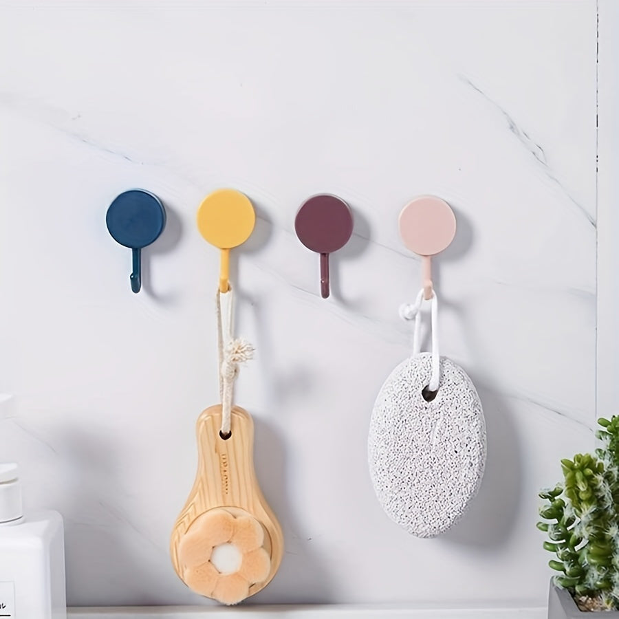 10 colorful adhesive hooks for easy wall-mounted storage in kitchen and bathroom, no drilling needed.