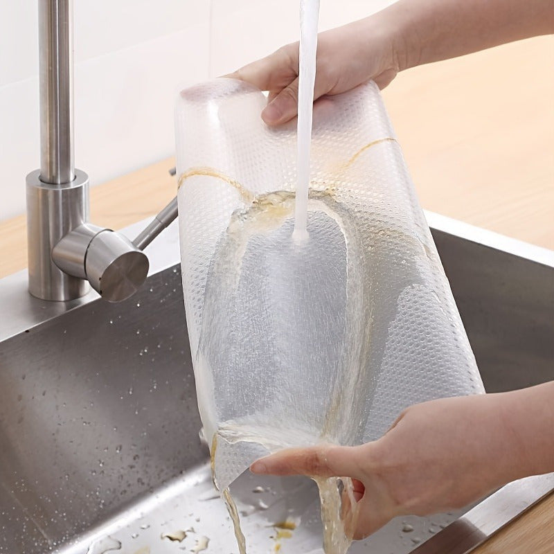 Effortlessly maintain the cleanliness and organization of your kitchen cabinets with our Transparent PET Kitchen Cabinet Liner. This waterproof, dust-proof, and non-slip liner boasts a textured grip for added stability, making it perfect for lining