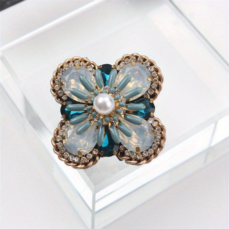 Creative statement jewelry with gemstone accents, a vintage-inspired bohemian floral enamel brooch pin designed for women.