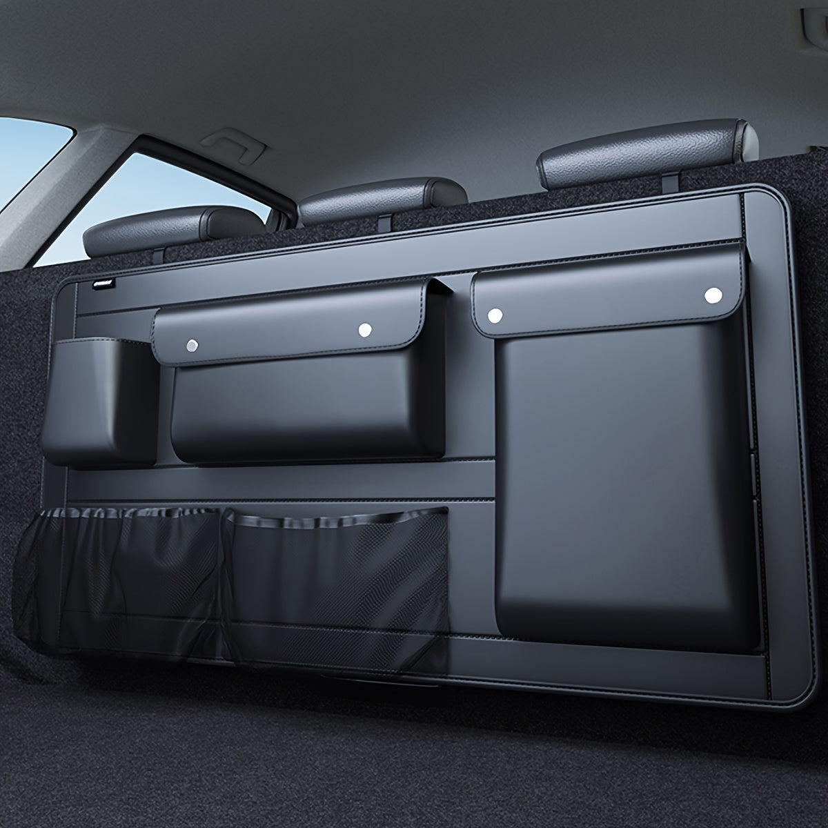 Car trunk storage bag for organizing miscellaneous items.