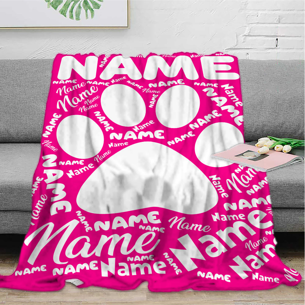 Cozy up with your furry friend's paw print on our custom flannel blanket. Personalize with their name for a warm and special touch. Perfect for snuggling on the couch, bed, or even at the office. Makes a thoughtful gift for any pet owner, family member