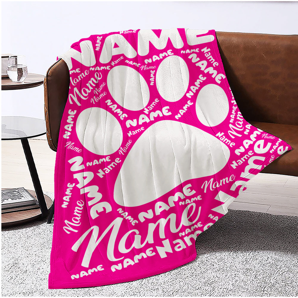 Cozy up with your furry friend's paw print on our custom flannel blanket. Personalize with their name for a warm and special touch. Perfect for snuggling on the couch, bed, or even at the office. Makes a thoughtful gift for any pet owner, family member