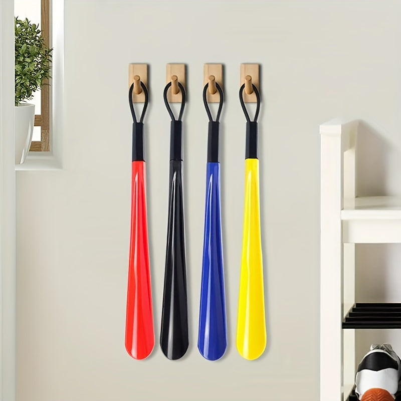 Extra long flexible plastic shoe horn with easy-grip spoon design, durable and lightweight. Available in red or black.