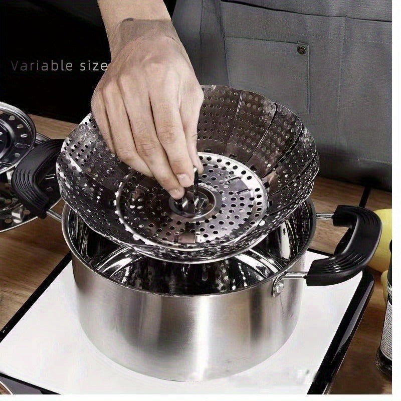 Folding stainless steel steaming tray with multiple functions, retractable design for easy storage, suitable for steaming various foods such as fruits and steamed buns, comes with a lattice steamer rack.