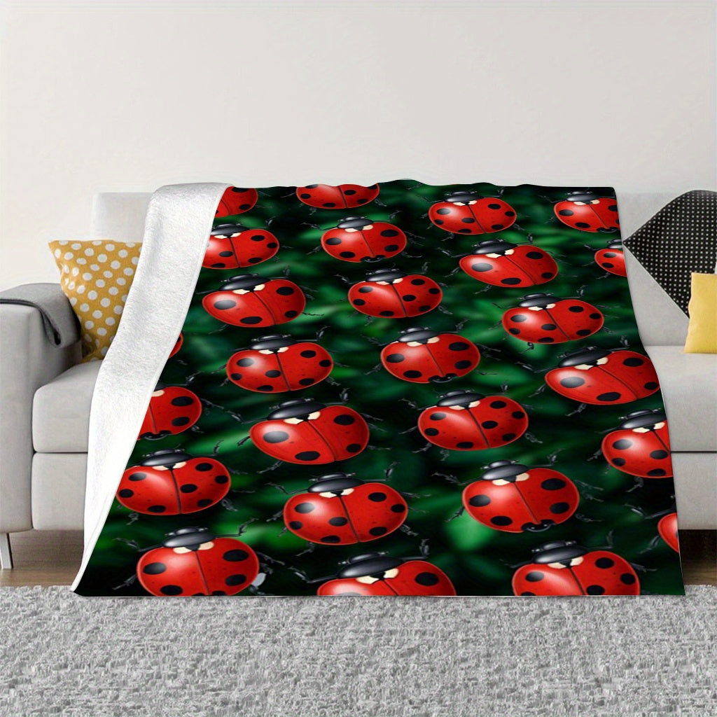 Soft and cozy ladybug print flannel throw blanket perfect for sofa, bed, office, and travel. This lightweight all-season blanket is made of a comfortable polyester knit, featuring a contemporary animal theme with digital printing. With a weight of