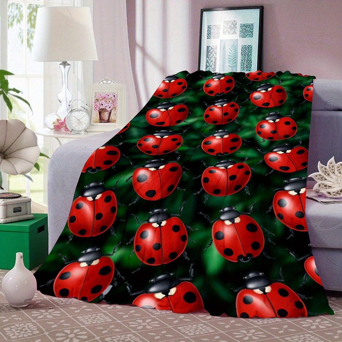 Soft and cozy ladybug print flannel throw blanket perfect for sofa, bed, office, and travel. This lightweight all-season blanket is made of a comfortable polyester knit, featuring a contemporary animal theme with digital printing. With a weight of