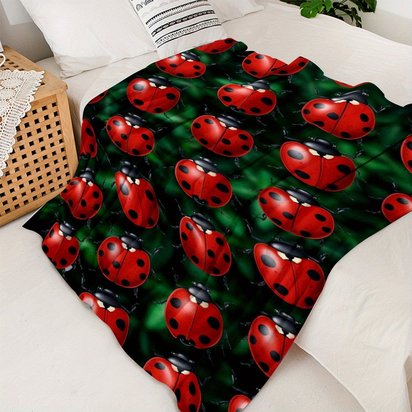 Soft and cozy ladybug print flannel throw blanket perfect for sofa, bed, office, and travel. This lightweight all-season blanket is made of a comfortable polyester knit, featuring a contemporary animal theme with digital printing. With a weight of