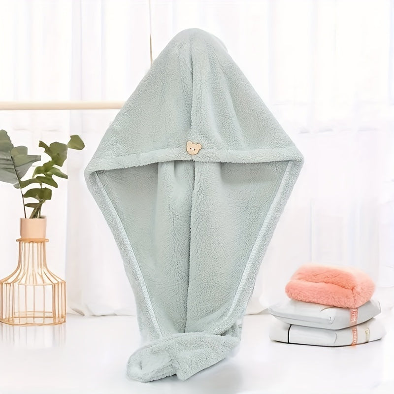 Contemporary geometric pattern dry hair towel made of polyester, fast-drying with high absorbency. Features a space-themed design, suitable for home use in the kitchen or bathroom.