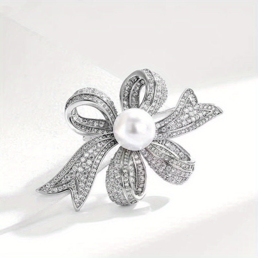 Elegant pearl brooch with a non-specific flower design, perfect for both women and men to wear as a fashion accessory. This silky scarf buckle exudes a luxurious and elegant temperament, making it a great holiday gift for anyone looking to add a touch of