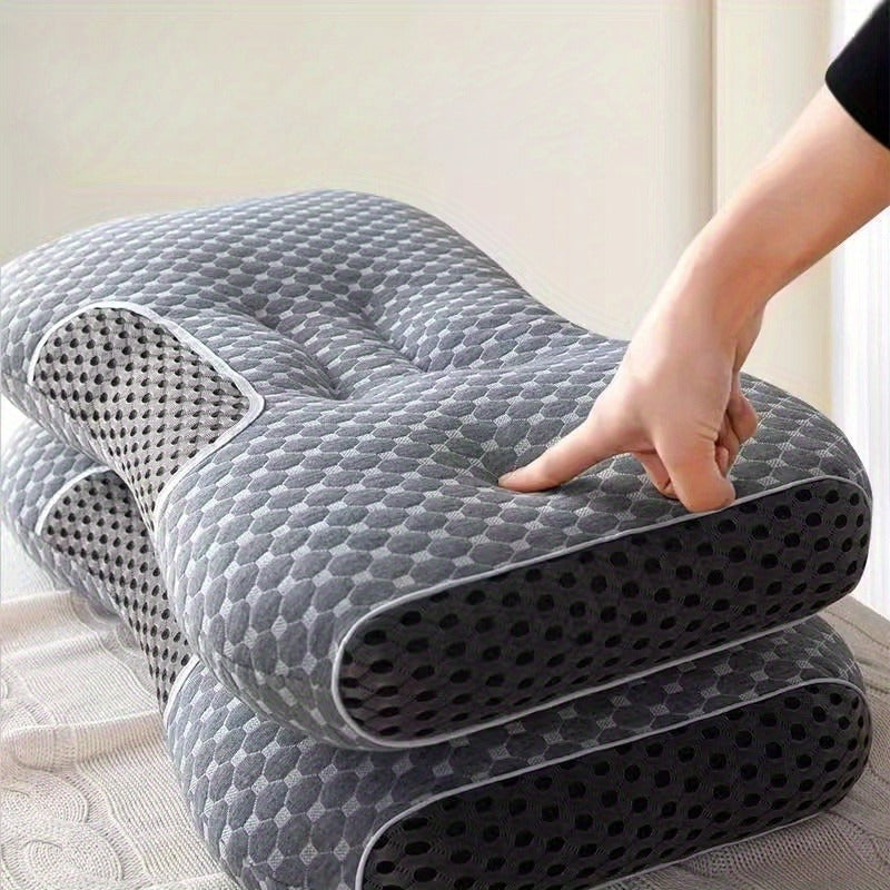 Ergonomically designed neck support pillow provides pain relief for back and stomach sleepers. Features a breathable polyester pillowcase that is washable. Includes a diamond pattern design and side bolster for added comfort. Ideal for those seeking