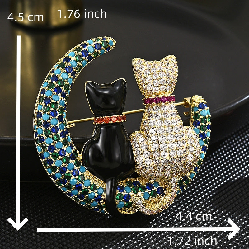 A stunning Crystal Cat Moon Brooch crafted in luxury, adorned with sparkling rhinestones and an elegant design - the perfect exquisite gift for women.