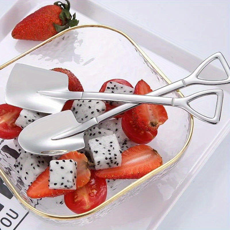 Set of 10 elegant dessert spoons in shovel shape for coffee, ice cream, and fruit.