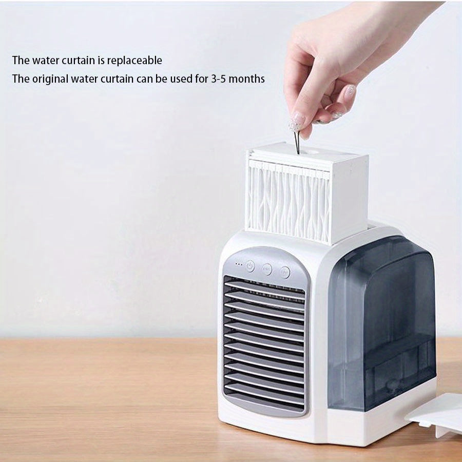 The Portable USB Mini Desk Fan with Water Cooling is a compact electric fan designed for indoor use. It features a cooling system similar to an air conditioner and comes with a power cord included.