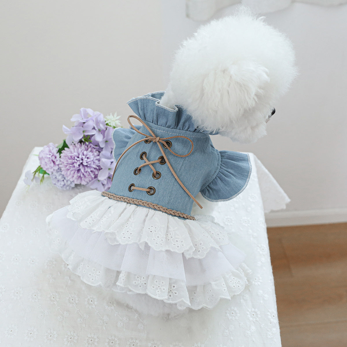 Stylish denim pet dress for small dogs and cats in blue with white fur, ruffled skirt, and lace detail. Ideal for Teddy, Bichon, Pomeranian puppies. Great gift for autumn/winter fashion.