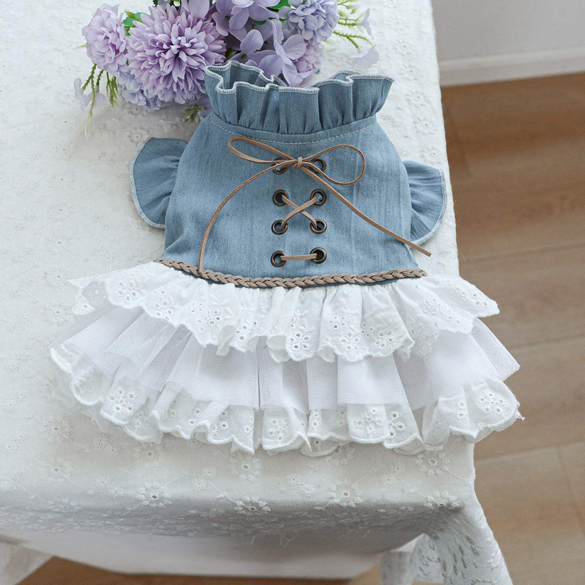 Stylish denim pet dress for small dogs and cats in blue with white fur, ruffled skirt, and lace detail. Ideal for Teddy, Bichon, Pomeranian puppies. Great gift for autumn/winter fashion.