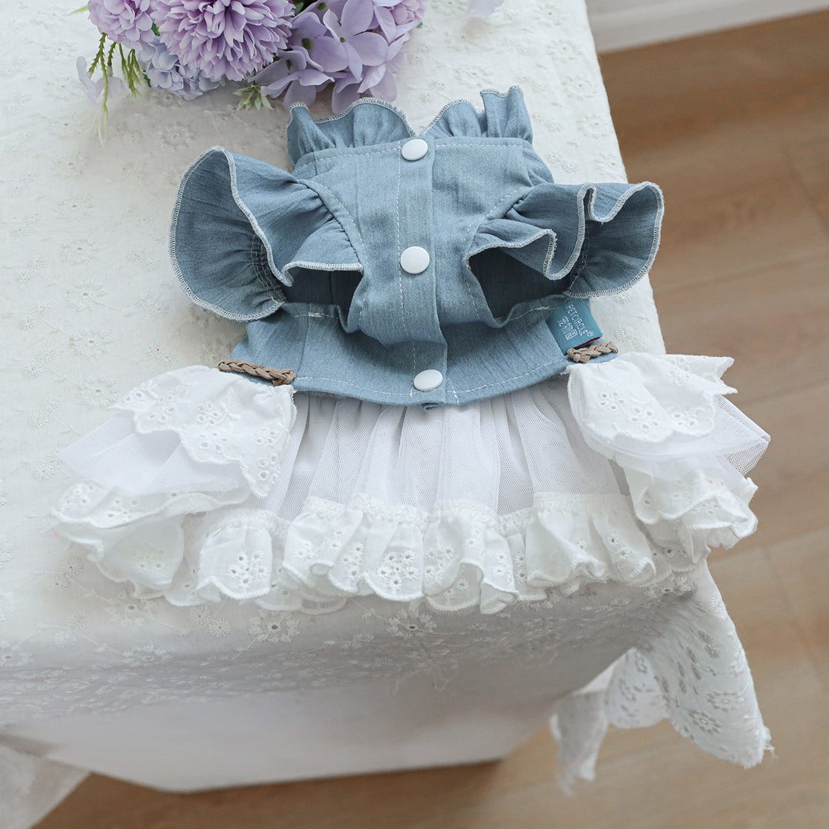 Stylish denim pet dress for small dogs and cats in blue with white fur, ruffled skirt, and lace detail. Ideal for Teddy, Bichon, Pomeranian puppies. Great gift for autumn/winter fashion.