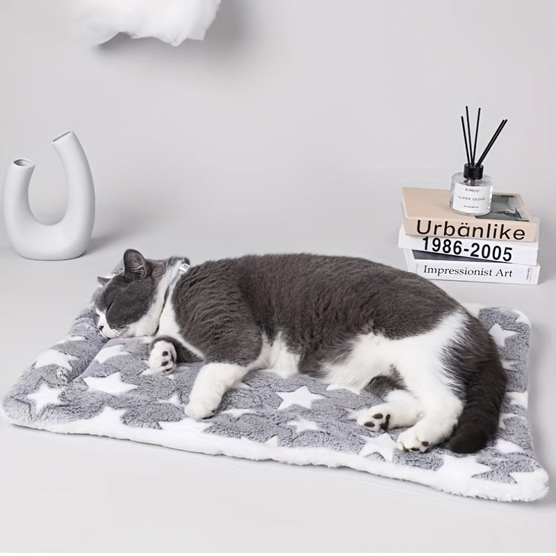 Luxurious plush flannel pet mat for cats and dogs with ultra-soft and extra-thick design, non-slip bottom, and machine washable.