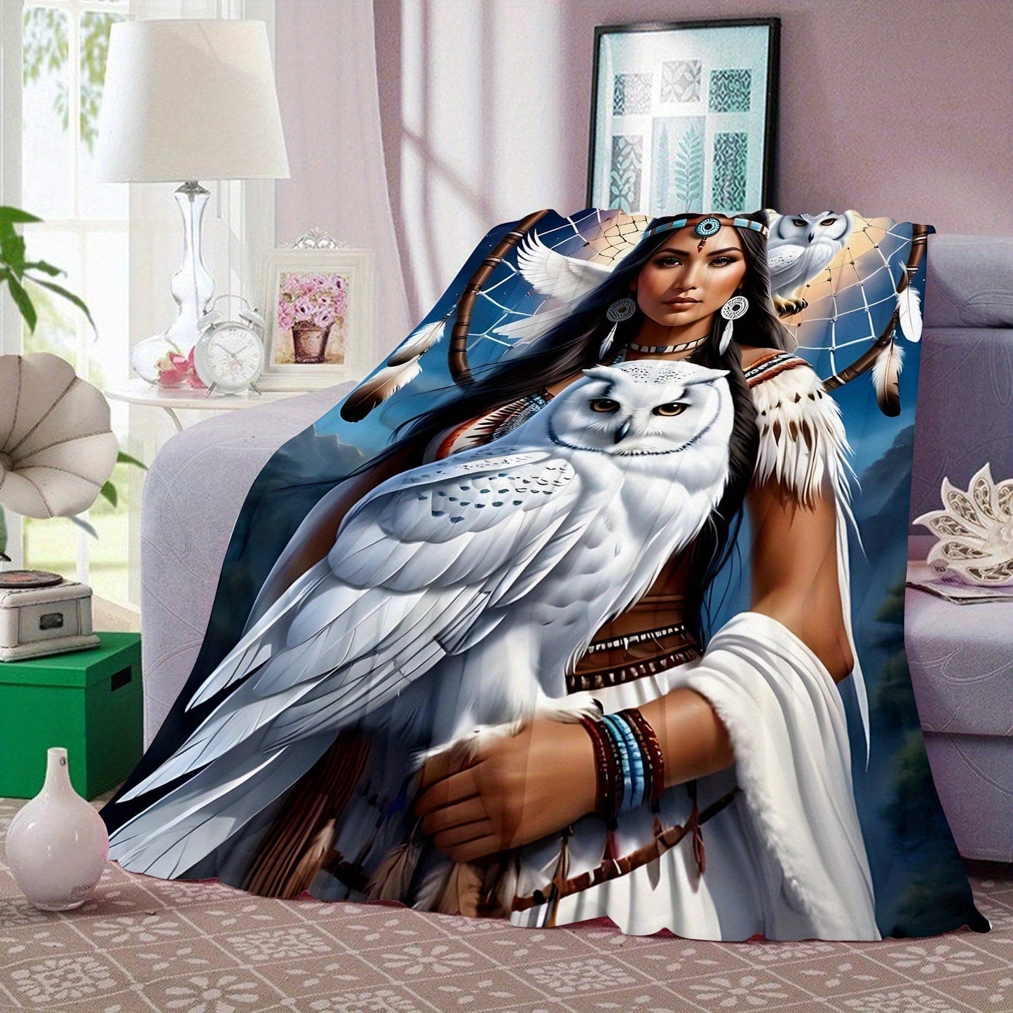 This soft and warm polyester knit flannel throw blanket features a digital print of an eagle queen, perfect for use on the sofa, bed, or while traveling or camping. The contemporary design includes a dreamcatcher and owl, making it suitable for use in