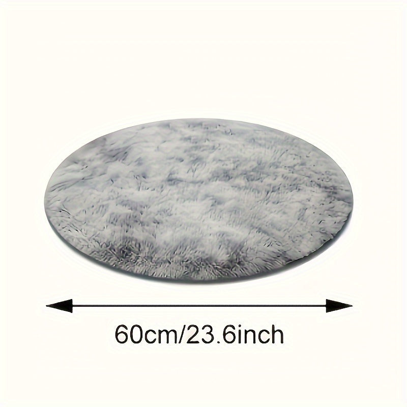 Soft and plush round gray area rug with a shag texture - Resistant to stains and slips, perfect as a fluffy decorative accent for your living room, bedroom, or home interior. Made of polyester and recommended for dry cleaning only. Ideal for adding a