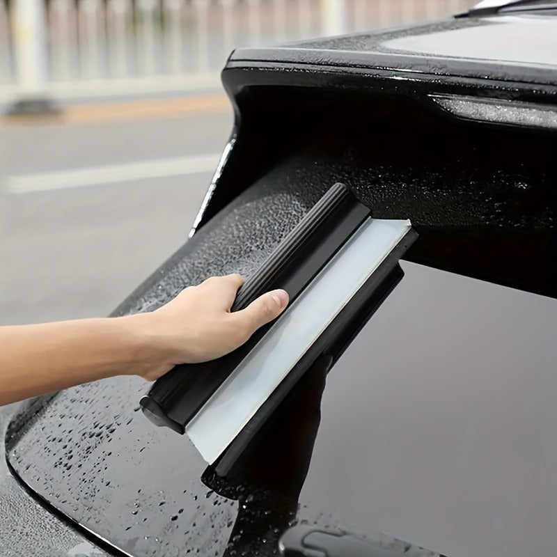 Silicone car wiper gentle on paint and ideal for glass and vehicle windows. Black with white edge for scratch-free cleaning.