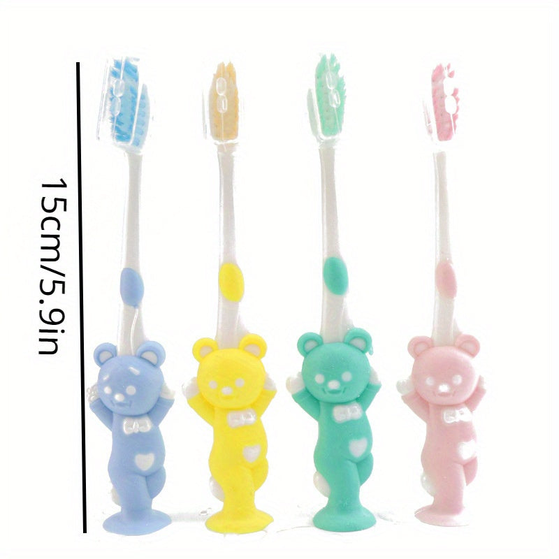 4 soft-bristled toothbrushes with charcoal and cute animal designs for teeth care.