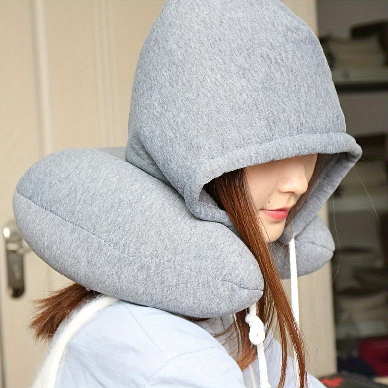 Travel in comfort with our Ergonomic U-Shaped Travel Pillow with Hoodie. This multipurpose neck support is adjustable for a cozy nap on airplanes, car trips, and bus journeys. Designed for adults 18 and older, it features a soft polyester filling and a