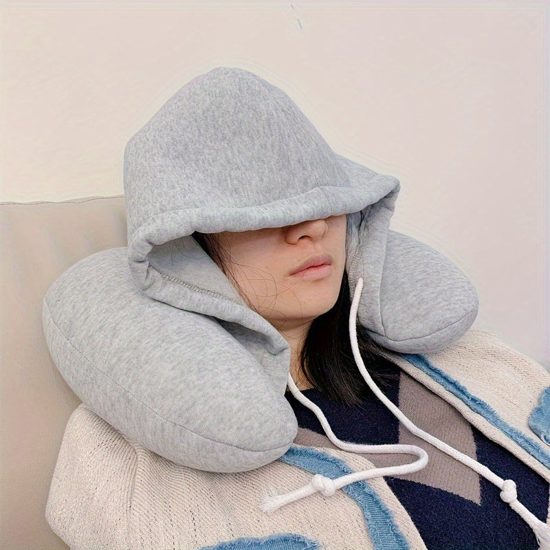 Travel in comfort with our Ergonomic U-Shaped Travel Pillow with Hoodie. This multipurpose neck support is adjustable for a cozy nap on airplanes, car trips, and bus journeys. Designed for adults 18 and older, it features a soft polyester filling and a