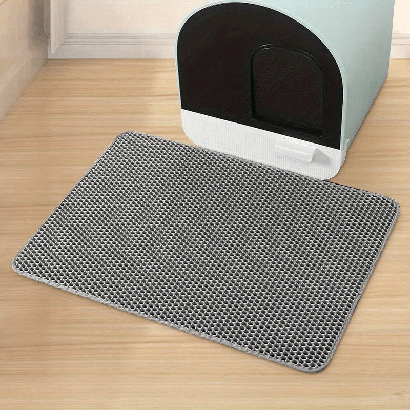 High-quality cat litter mat with double-layer honeycomb design for easy cleaning and odor control, suitable for both pet toilets and litter boxes.