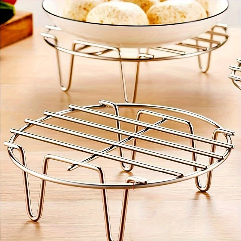 Durable and versatile stainless steel round steamer rack - A handy kitchen tool for steaming and cooking with an easy-to-clean design.