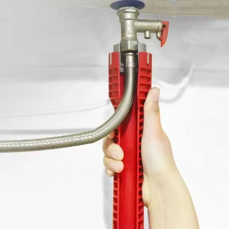 Versatile 5-in-1 red plastic wrench for sink and faucet installation in bathrooms and kitchens.