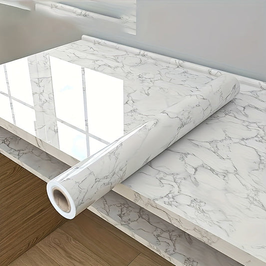 Reinvent your space with our Marble Pattern Self-Adhesive Wall & Table Sticker. This sticker is waterproof, heat-resistant, and oil-resistant, making it perfect for kitchen cabinets and furniture makeover projects.