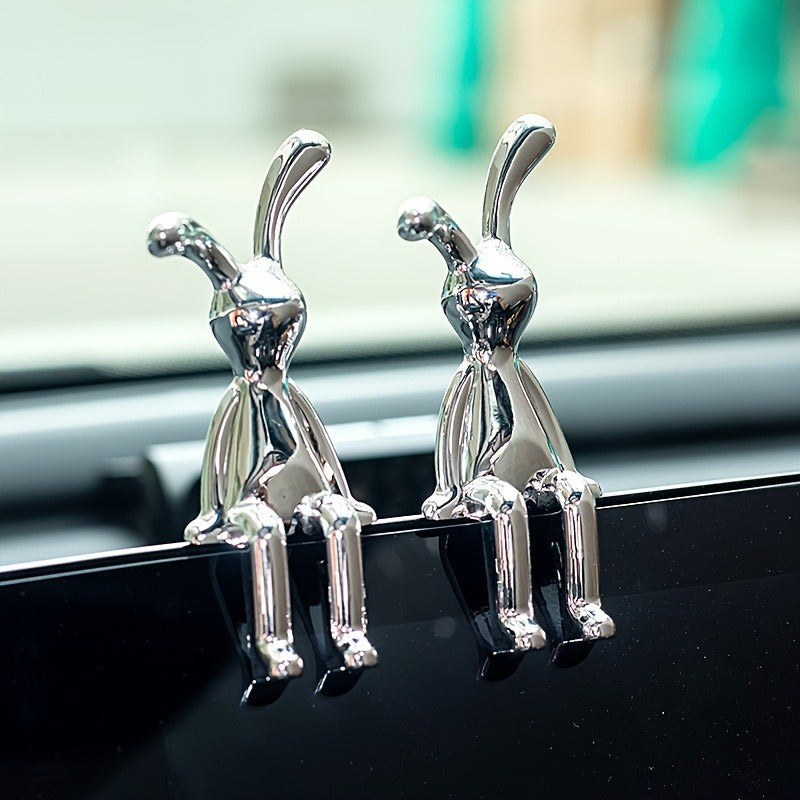 Two silver-plated resin rabbit ornaments perfect for any room, making a great Easter gift.