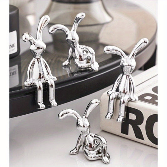 Two silver-plated resin rabbit ornaments perfect for any room, making a great Easter gift.