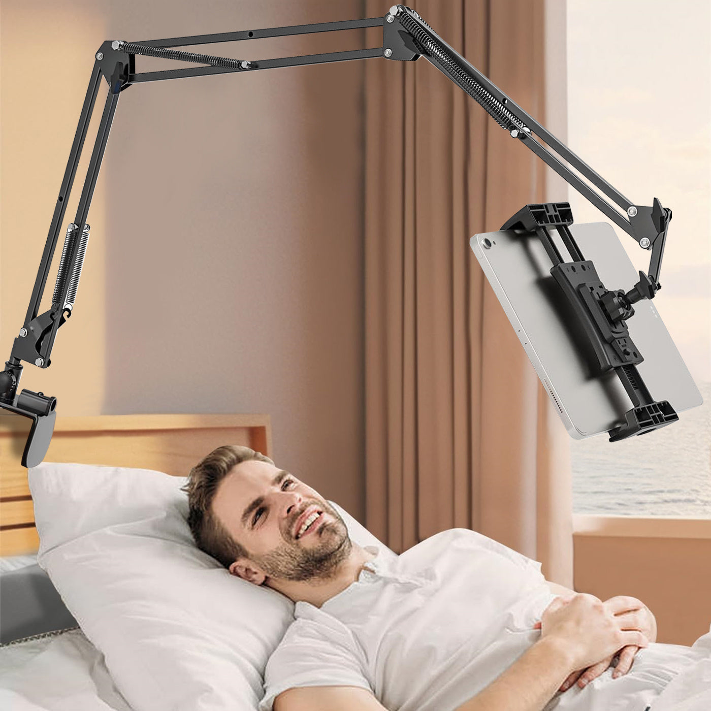 Rotating tablet holder for bed, compatible with various devices, adjustable size.