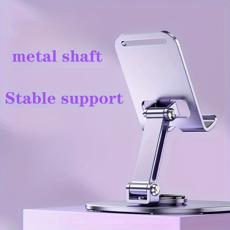 Compact, foldable metal phone stand rotates 360 degrees, ideal for smartphones and tablets. Perfect for office use.